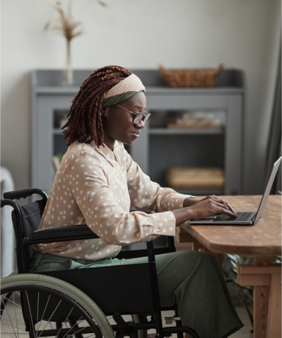 woman in wheelchair working