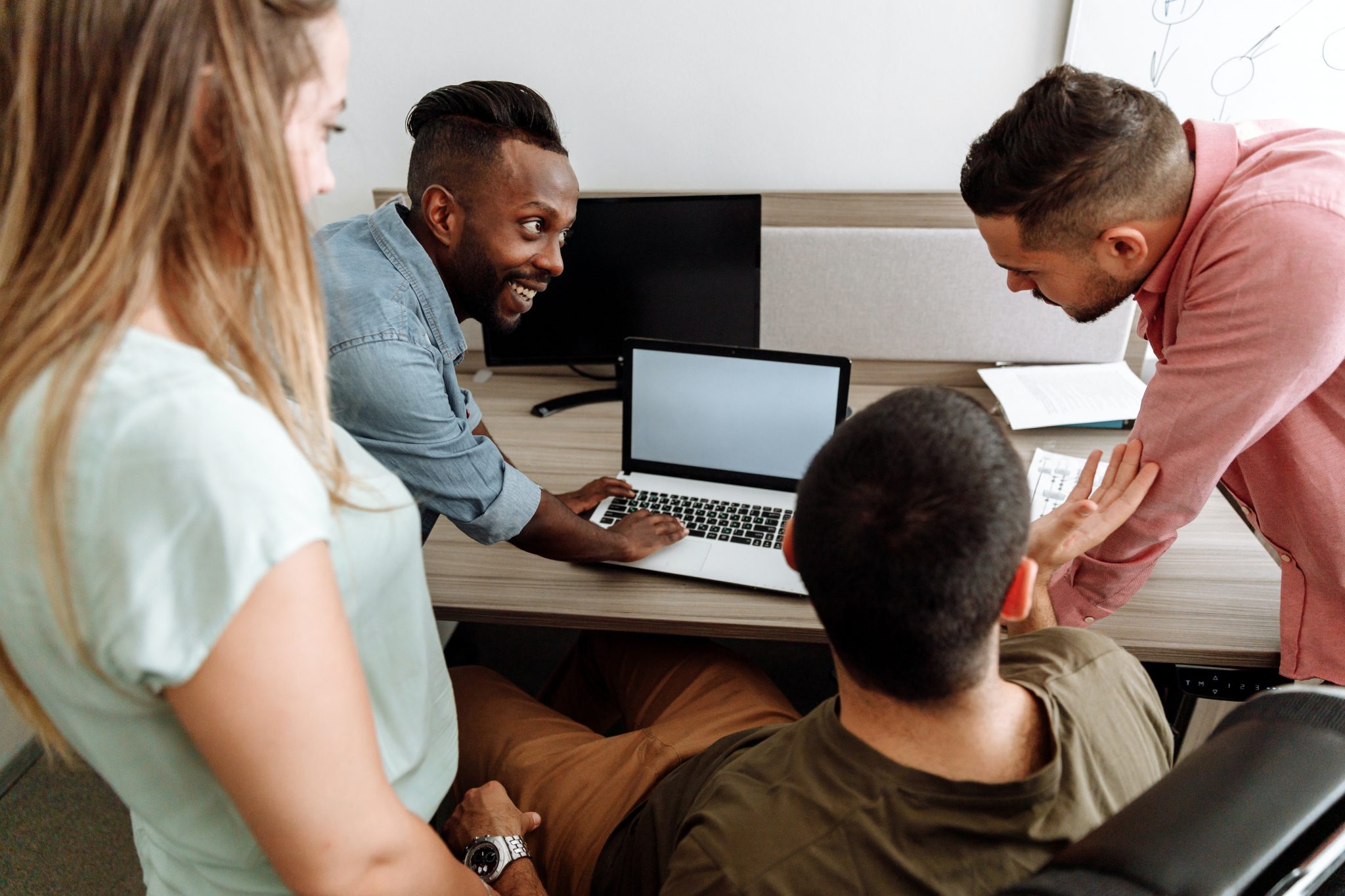 A group of colleagues registering their new business in the UK